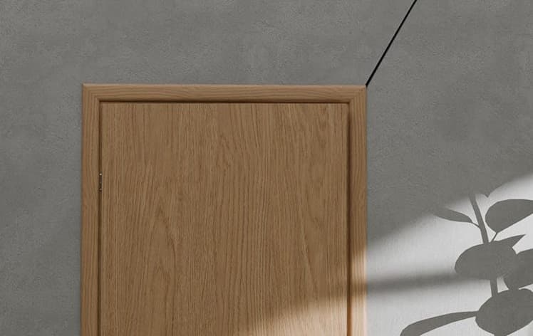 Are door frame cracks normal, and how do you fix them?