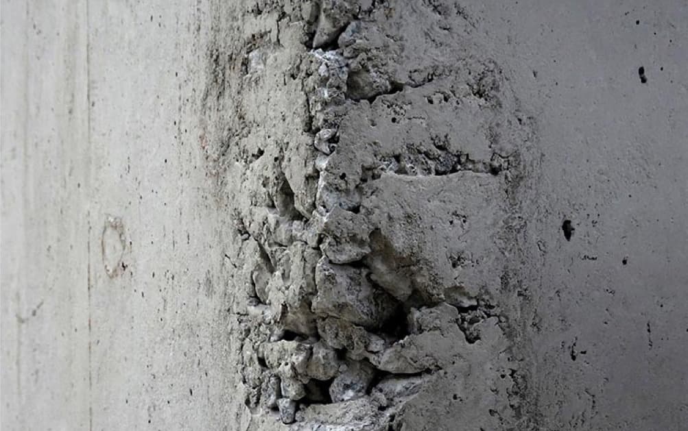 Honeycombing visible on a concrete surface