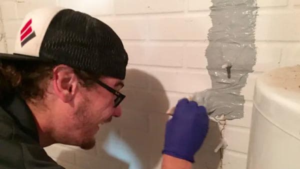 Non-structural hairline cracks in walls are cosmetic and don't affect the building's structural integrity. They're generally narrower than 1/10th of an inch.
