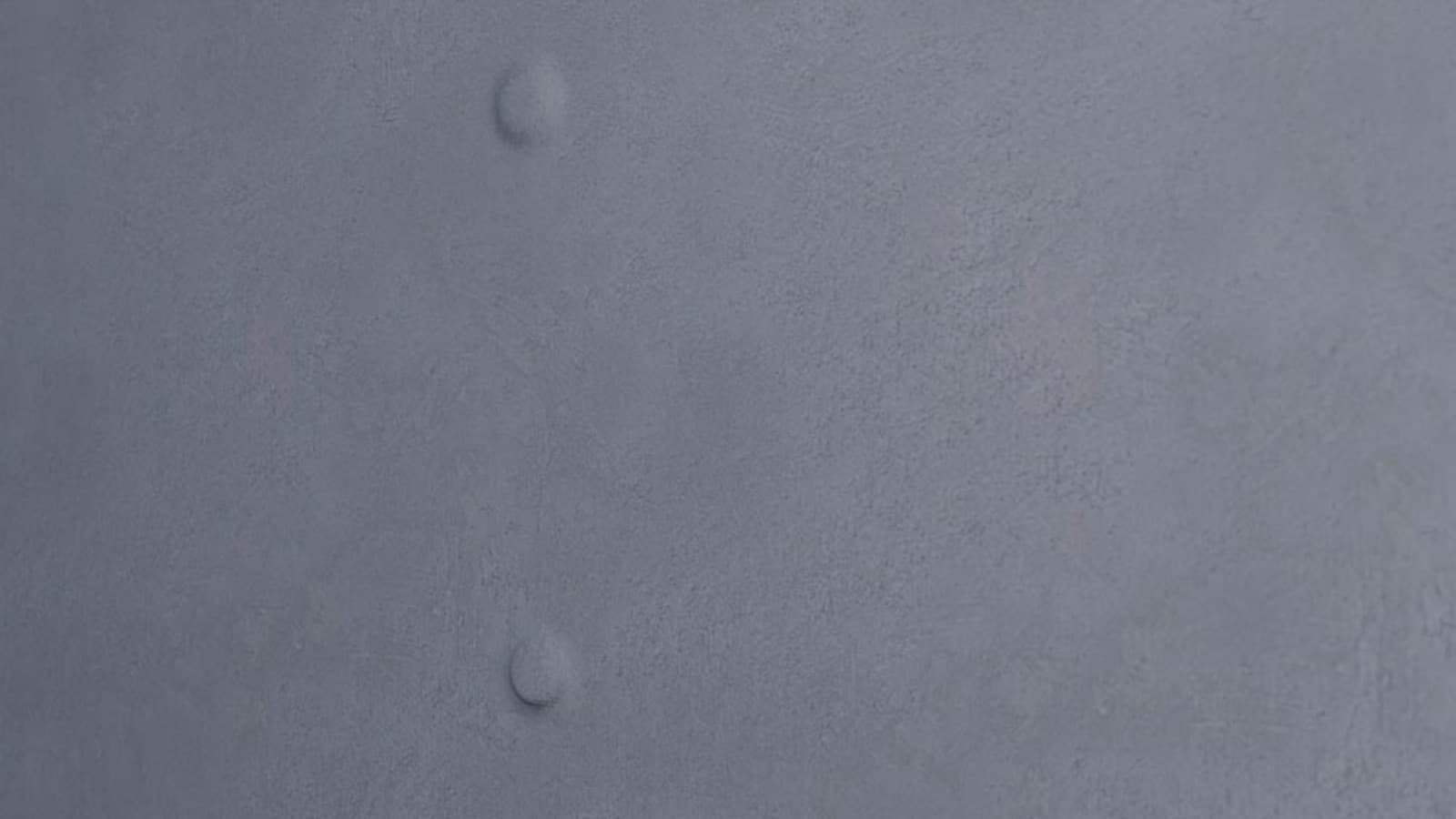Nail pop showing on a drywall ceiling