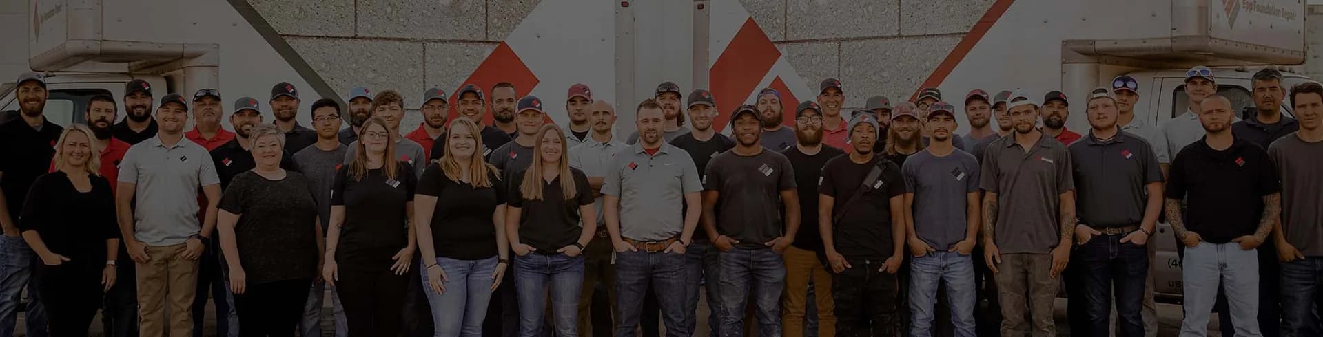 The Epp Foundation Repair crew in front of the company's service trucks