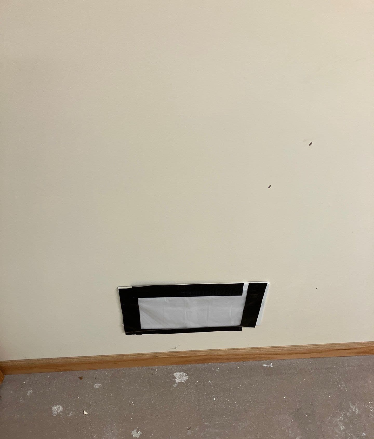 Epp Foundation Repair installing a crawl space vent cover for moisture control in Lincoln, Nebraska.