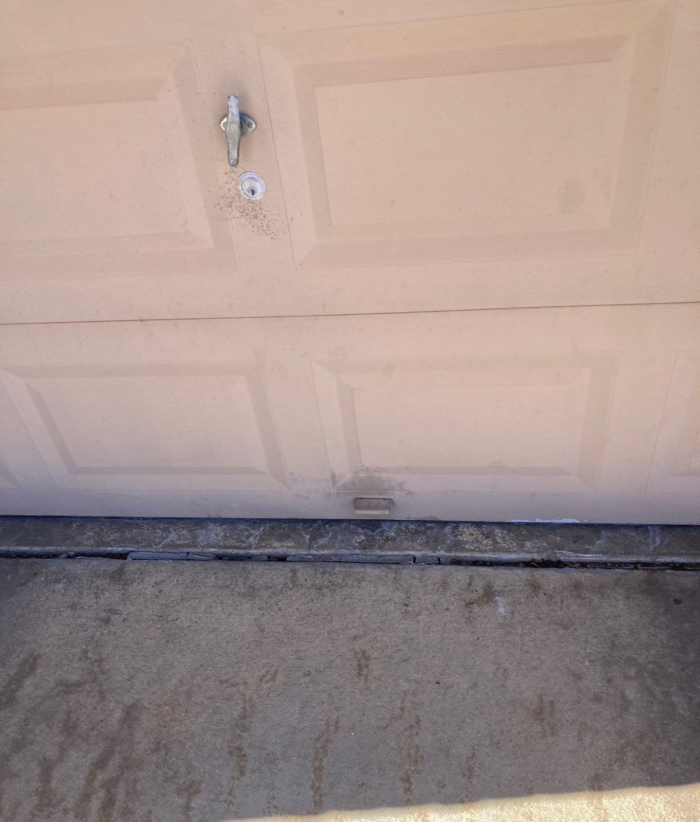 Underlying cause of sagging lintel above garage door in Midwest homes