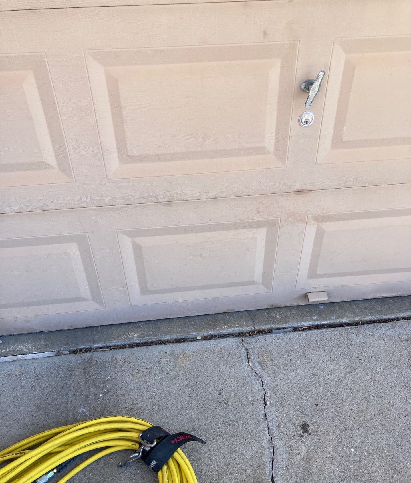 Underlying cause of cracked garage floor in Midwest homes