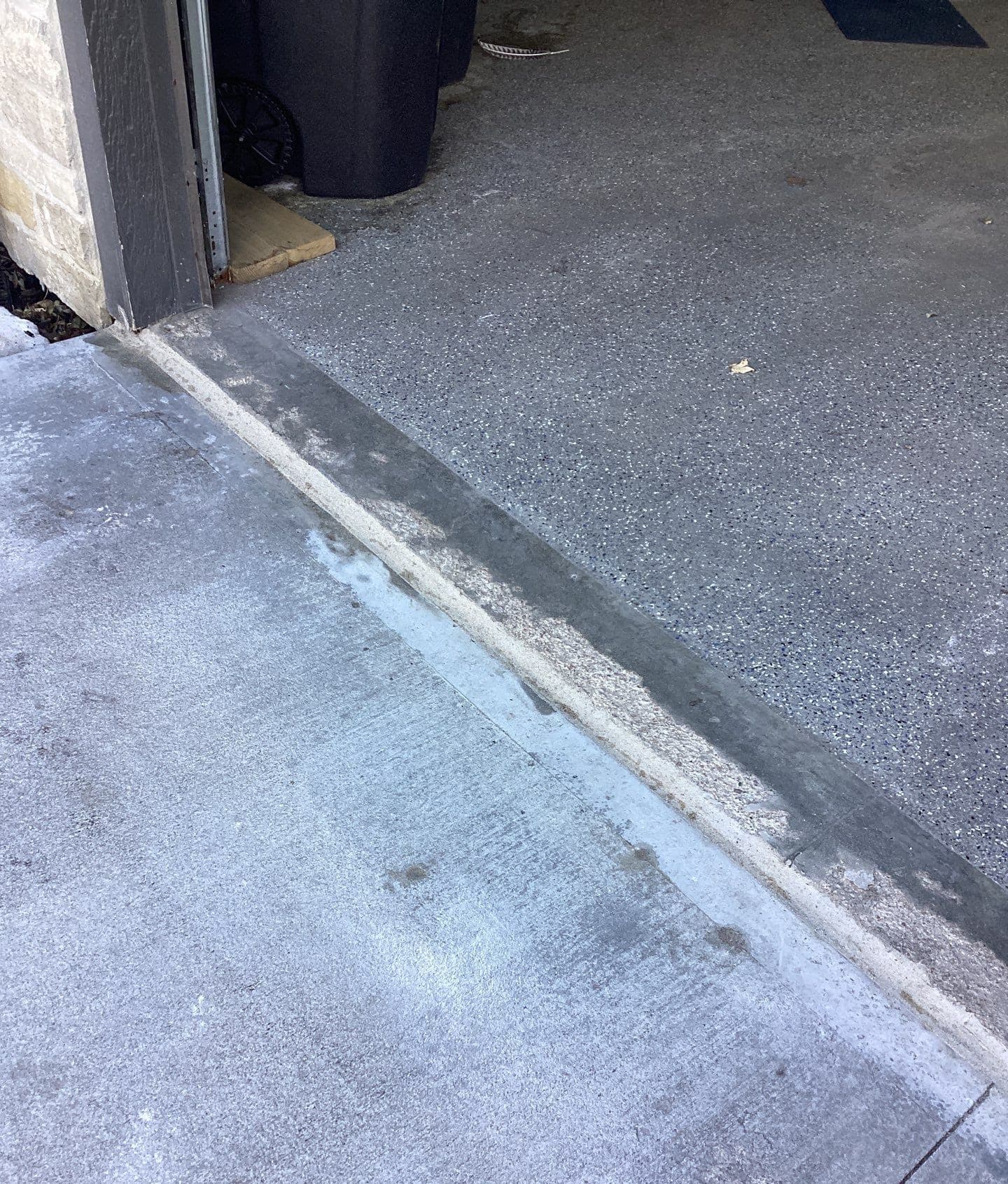 Underlying cause of pitting, flaking, and staining on exterior concrete in Midwest homes