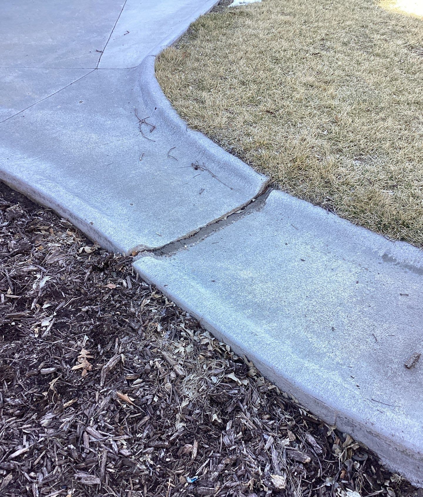 Underlying cause of sinking driveways diagnosed and lifted back to grade in Midwest homes
