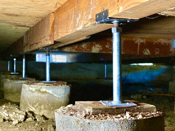 Epp Foundation Repair installing adjustable smart jacks to stabilize a crawl space