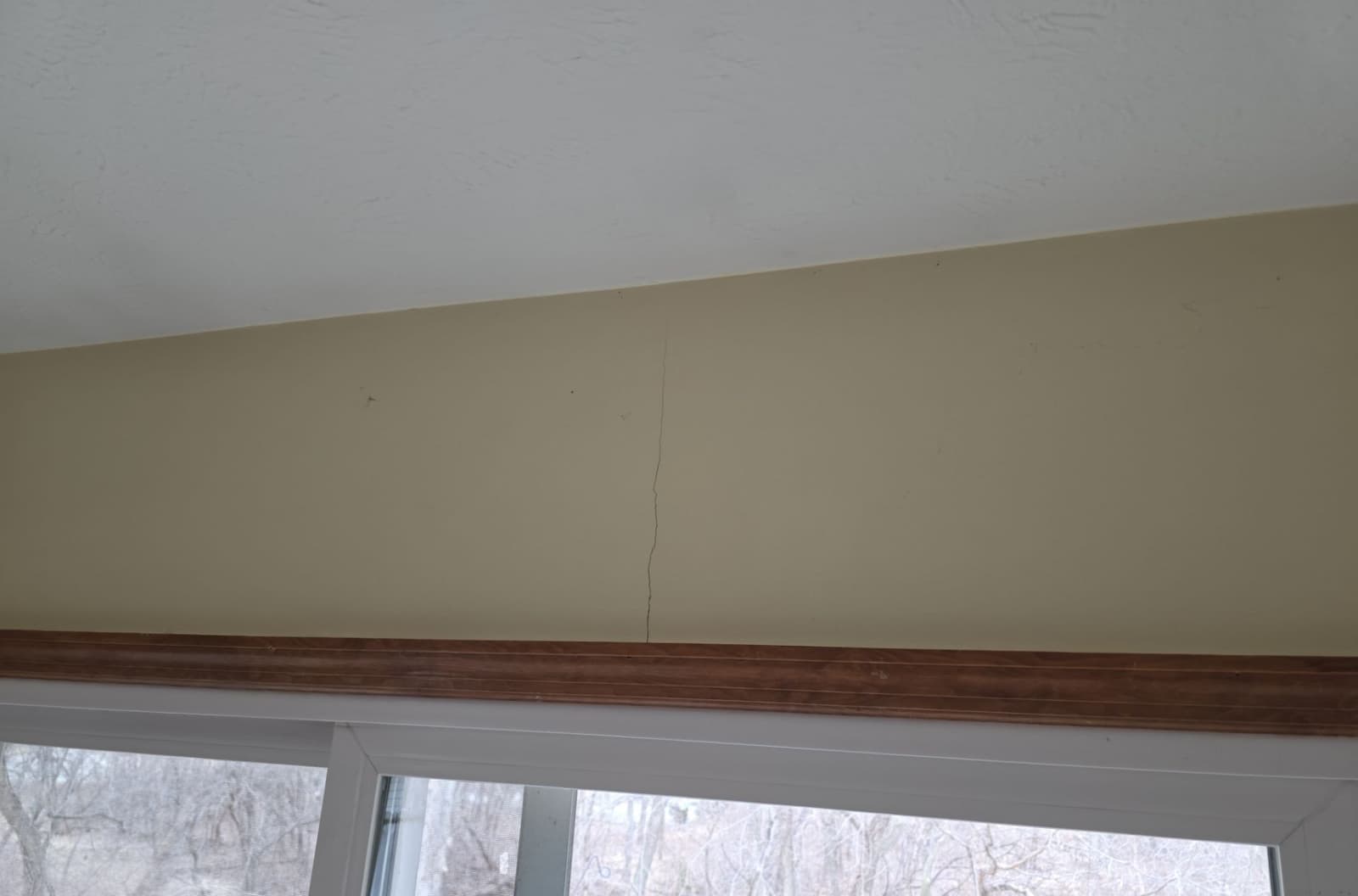 Early warning signs of drywall cracks diagnosed at the foundation, not the patch on a Midwest home