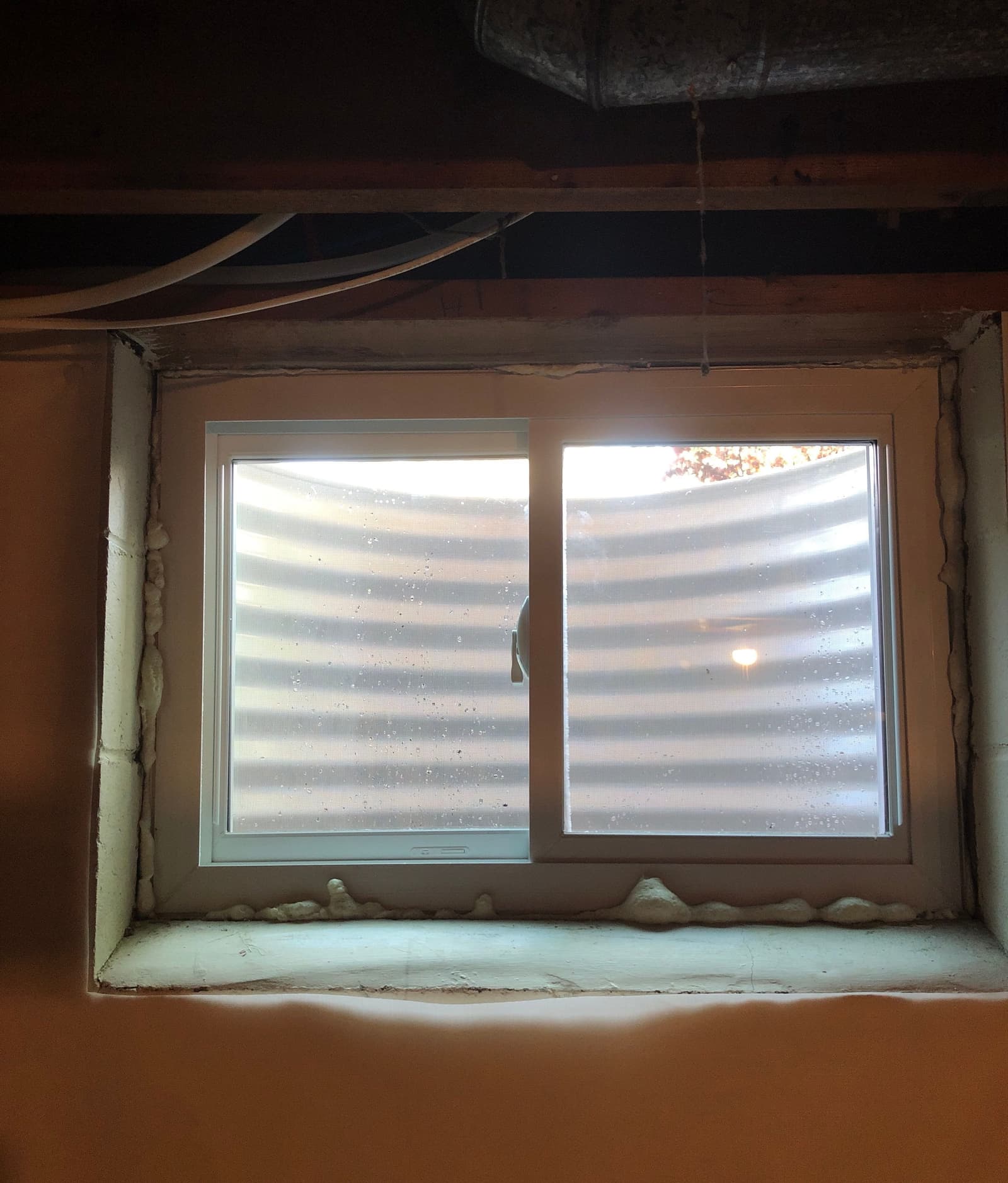 Early warning signs of condensation on windows on a Midwest home