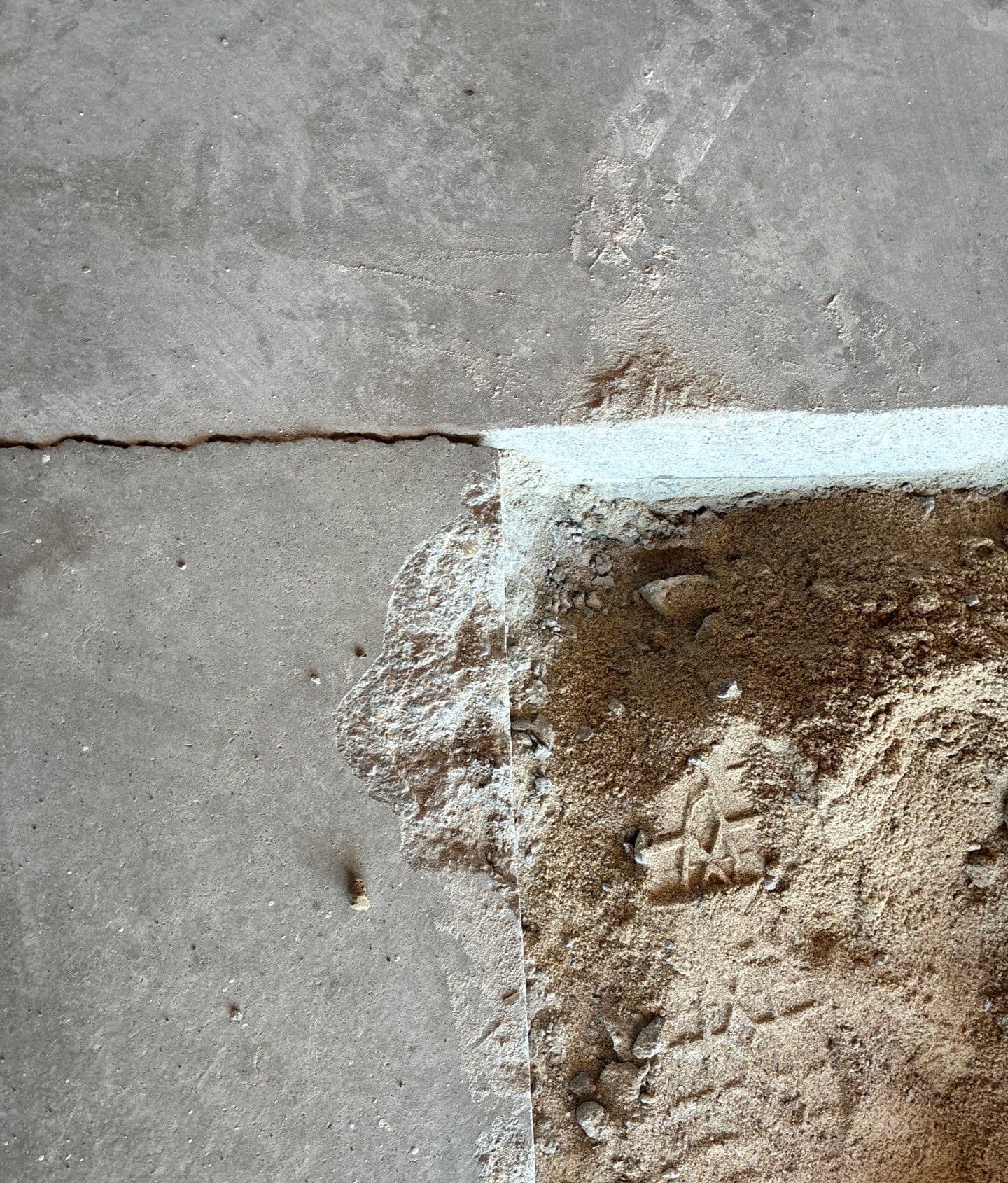 Early warning signs of broken sidewalks on a Midwest home