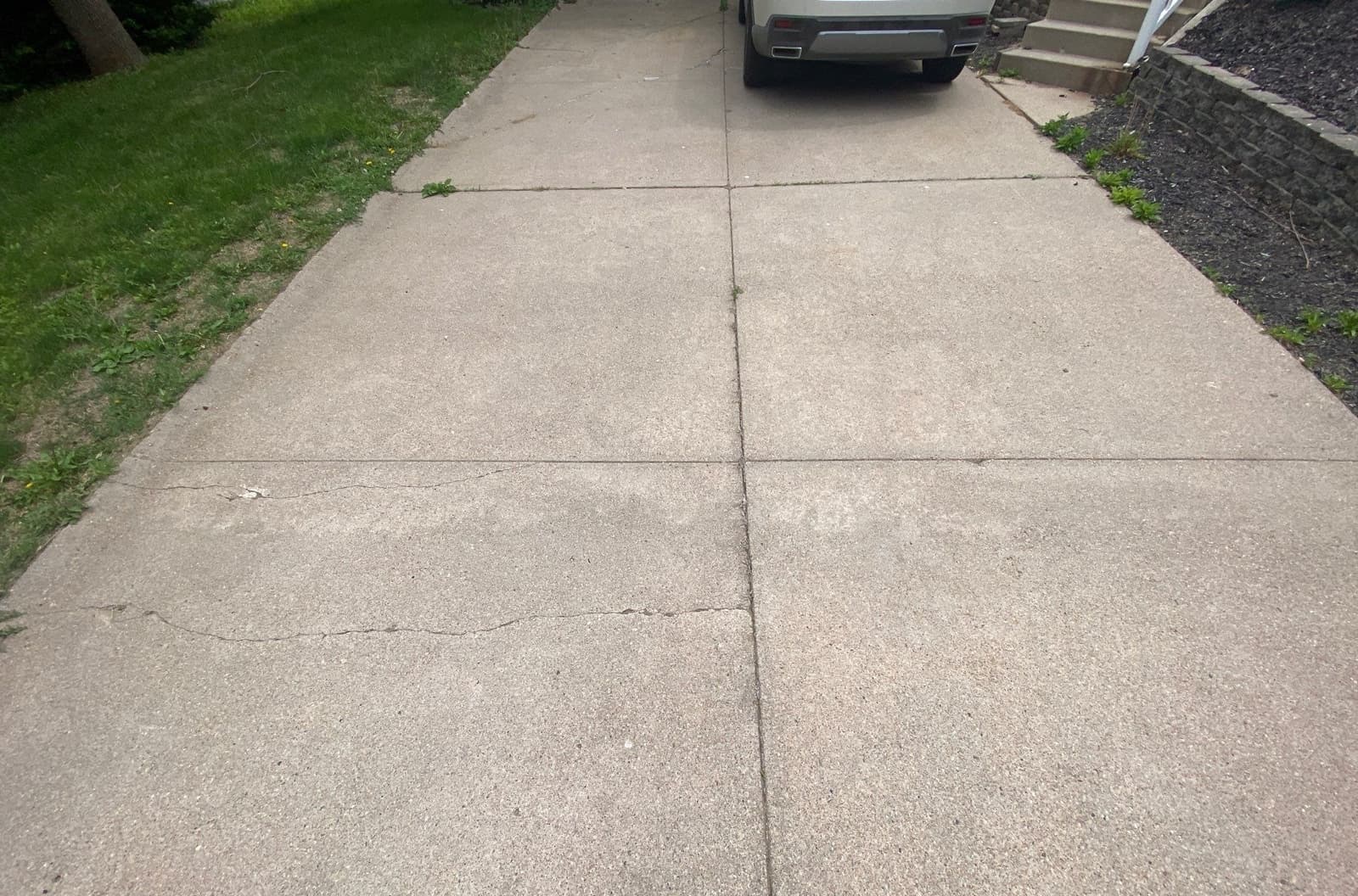 Underlying cause of cracked driveway in Midwest homes