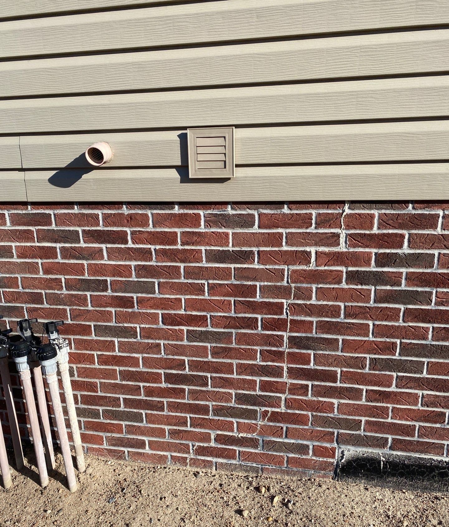 Underlying cause of cracked brick veneer diagnosed and stabilized in Midwest homes