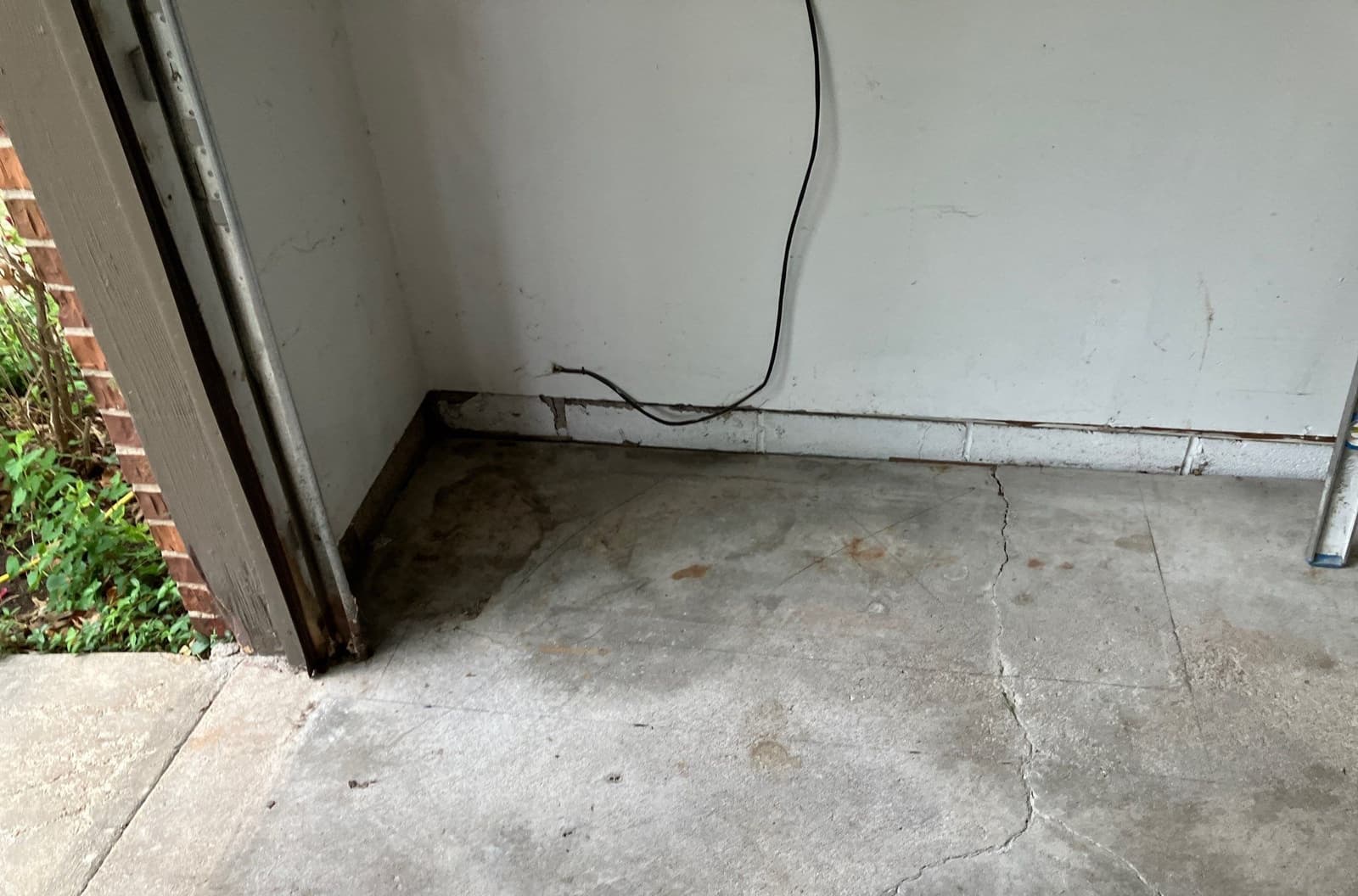 Underlying cause of cracked garage floor in Midwest homes