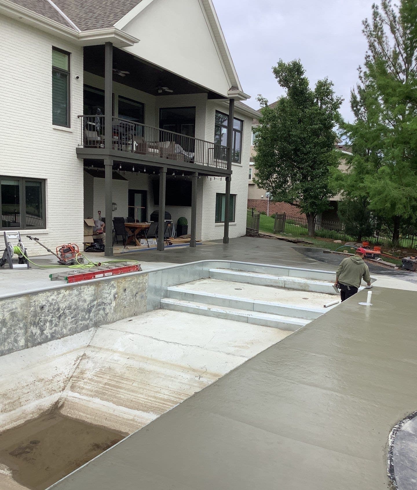 Underlying cause of pool deck settling and tilting around the pool in Midwest homes