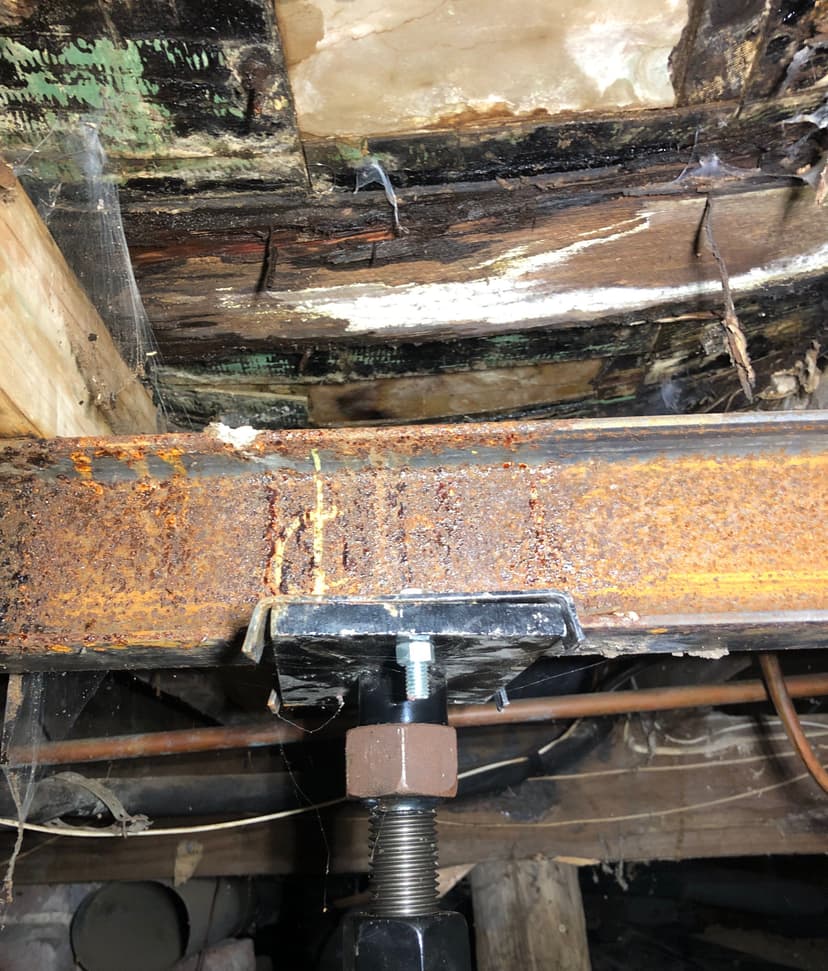 Epp Foundation Repair installing an adjustable smart jack to support a rusty steel beam and damaged joists in a crawl space i