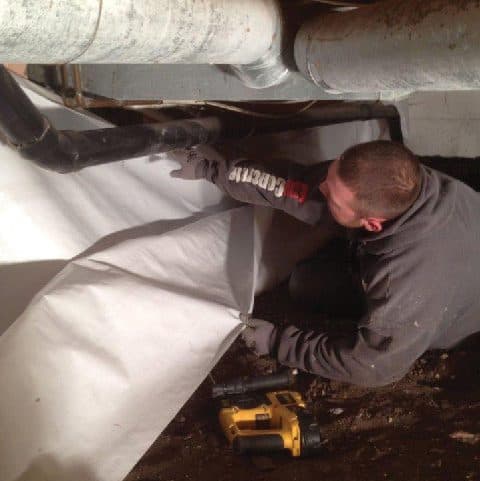 Epp Foundation Repair installing a white vapor barrier for crawl space encapsulation