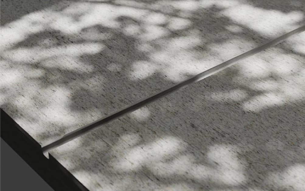 Control joint cut into a concrete slab