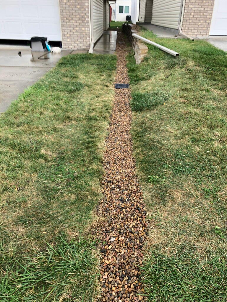 An exterior foundation drain, or a perimeter or footing drain, is a trench around the outside perimeter of your foundation filled with gravel or rock containing a perforated pipe that redirects groundwater away from your home.